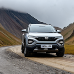 Tata Harrier - Rugged Outdoor Adventure**

"A Tata Harrier SUV, fully clothed, driving on a rocky mountain road, daytime, overcast sky, landscape view, appropriate attire, safe for work, perfect anatomy, correct proportions, professional car photography, high quality, family-friendly, modest, no people visible."

**
